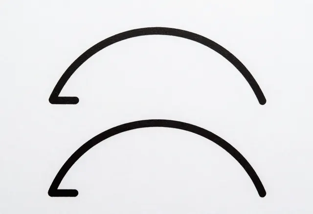 Two thin black arcs on white, a study in identical curvature